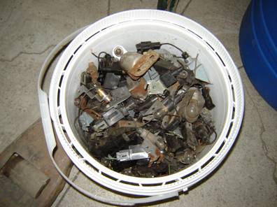 A collection bucket full of vehicle convenience lighting assemblies 