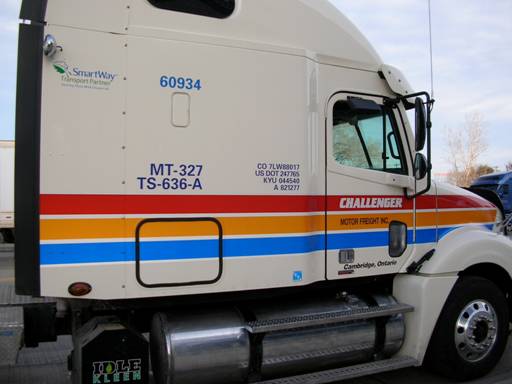 A Challenger Motor Freight Inc. [largest privately-owned truck load carrier in Canada] truck tractor outfitted with the latest fuel efficiency improvements.  Challenger provided its truck for the SmartWay Transport Partnership and Midwest Clean Diesel Initiative's "Idle Free Quiet Zone" Launch in Detroit, Michigan, in November, 2007. The firm has also equipped city fleet units with tracking devices that monitor driver's exact routes, idle times, road speed and hard stops.