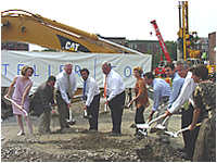 Photo of partners, including Mayor Menino (center) break ground on the construction of Atelier 505 