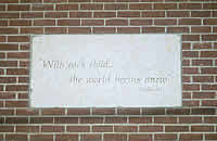 Photo of plaque at "r" Kids Family Center. Click for a larger image.