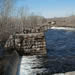 Overlooking the Pratt Dam from the bike path during a post flood event, this river control structure represents the approximate southern extent of the Site.