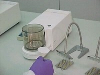 Photo showing Filter Weighing Session. This links to a larger image.