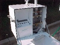 Photo showing the BGI PQ200A Air Sampler Control Panel and Sampling Apparatus. This  links to a larger image.