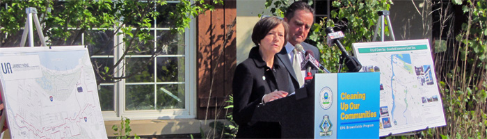 EPA Regional Administrator Susan Hedman announces Brownfields grants as Green Bay Mayor Jim Schmitt looks on.