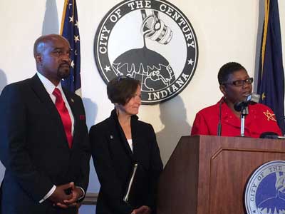 HUD Region 5 Administrator Antonio Riley, EPA Region 5 Administrator Susan Hedman and Gary Mayor Karen Freeman-Lewis announce the Sheraton Hotel demolition.