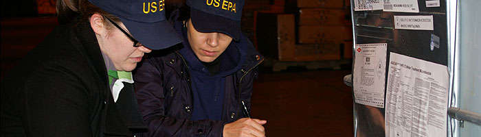 EPA investigators Claudia Niess and Estrella Calvo inspect for illegal pesticides imports at the Port of Chicago