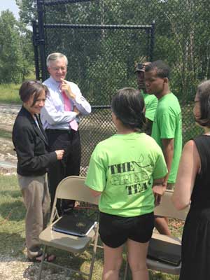 EPA Region 5 Administrator Susan Hedman and Grand Rapids Mayor Heartwell talk to members of Calvin College's Green Team, an urban youth watershed ecology program.