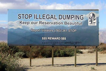 Photo of a, "Stop Illegal Dumping" sign.