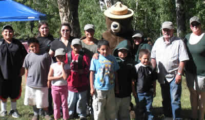 Yomba Shoshone youth and Smokey Bear at Yomba Nature Days.