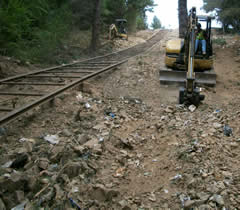 Joint Tribal-State-Federal dump cleanup on steep slope at Yurok Reservation