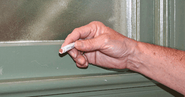 Person doing lead paint test.