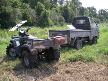 two all terrain vehicles used to access remote wetland sites in Louisiana