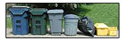 Photo of recycling bins and trash cans