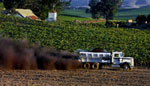 truck spreading compost