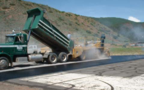 Truck spreading compost