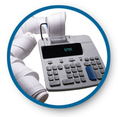 Image of desktop calculator and roll of paper.